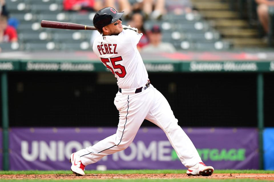 Roberto Perez of Cleveland hits a two-run home run against the Detroit Tigers in the second inning during a game at Progressive Field on April 10, 2021 in Cleveland, Ohio.