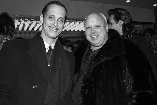 <p>Catherine McGann/Getty</p> John Waters and Divine