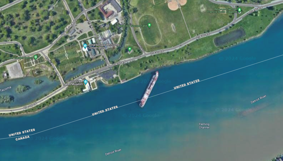 A Google Maps image taken of Belle Isle in May 2023 shows the Mark W. Barker running aground in the Detroit River near the east end of Belle Isle.