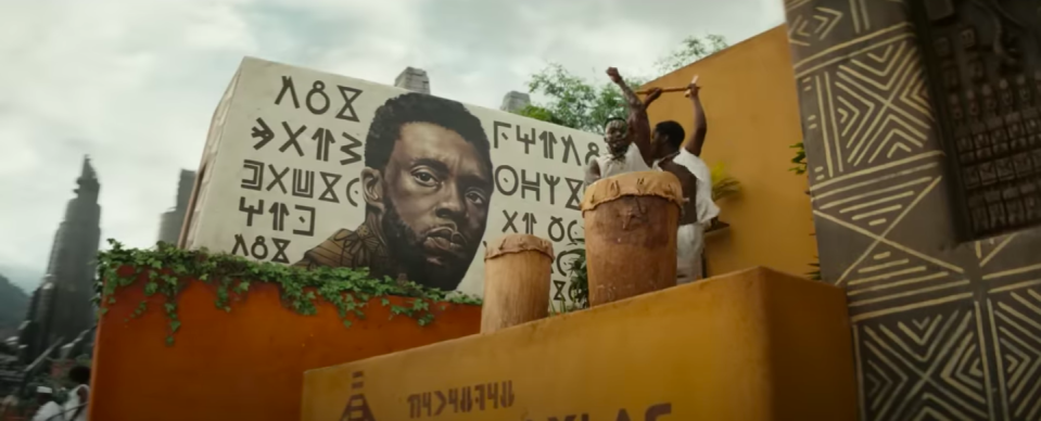 A painting of T'Challa on the side of a building