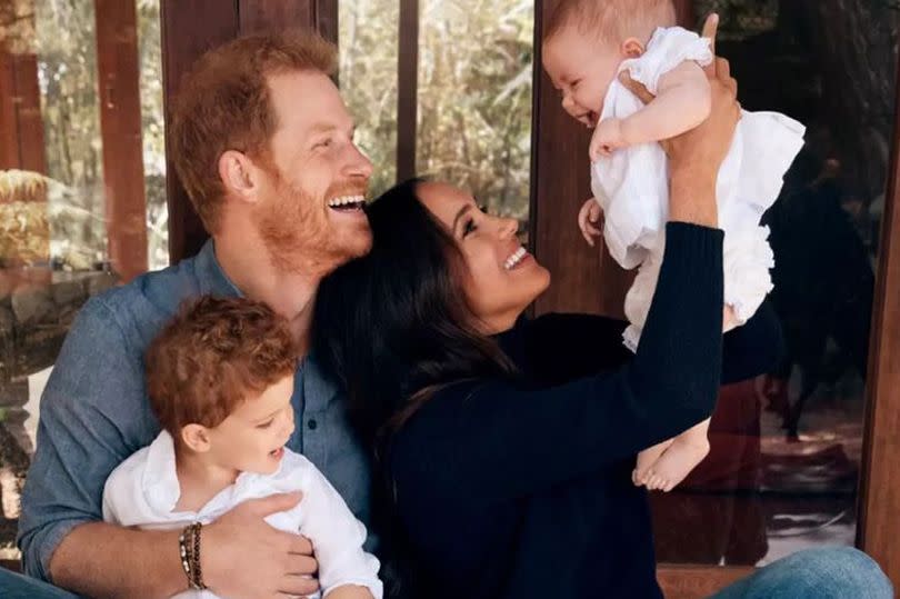 Prince Harry and Meghan Markle with their children Archie and Lilibet