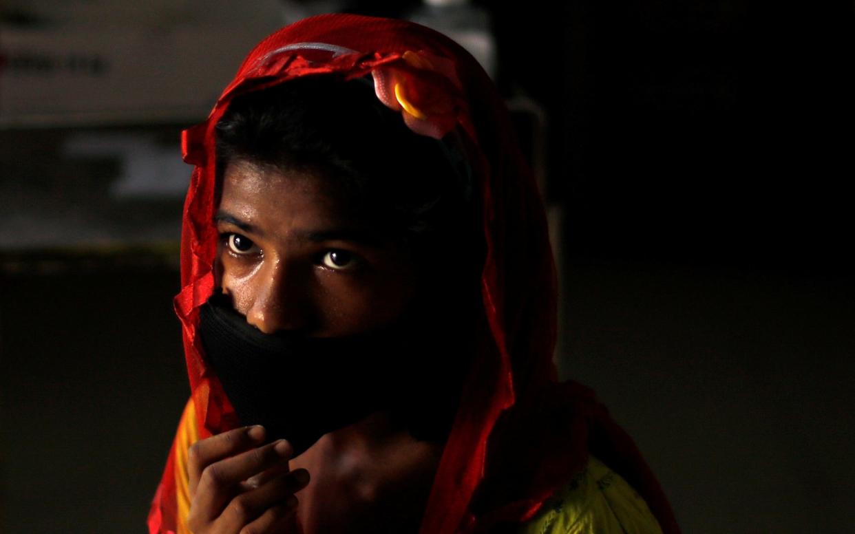 A girl wearing a protective face mask