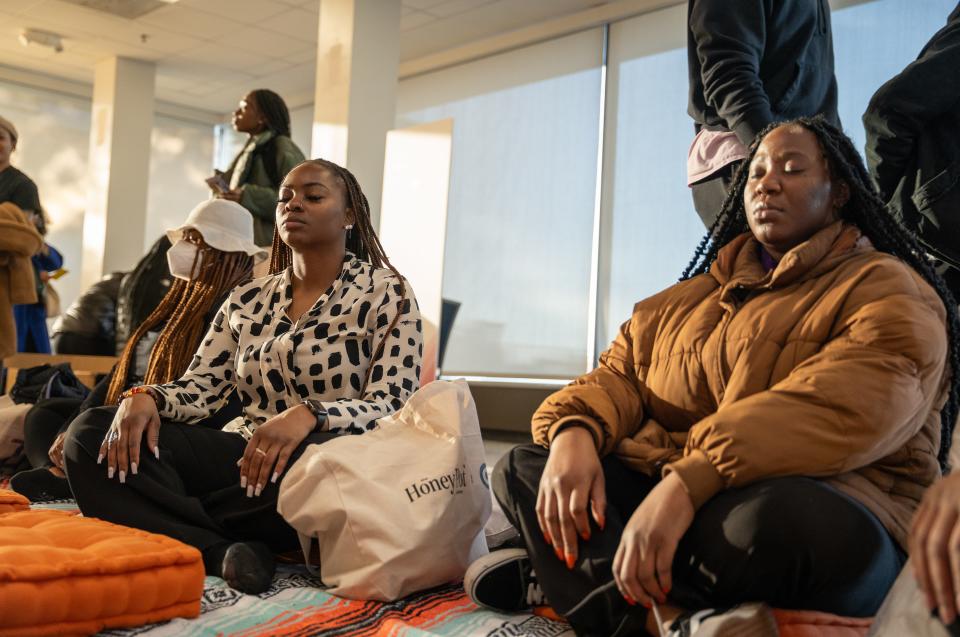 Students engage in a sound bath session, resetting their minds and bodies