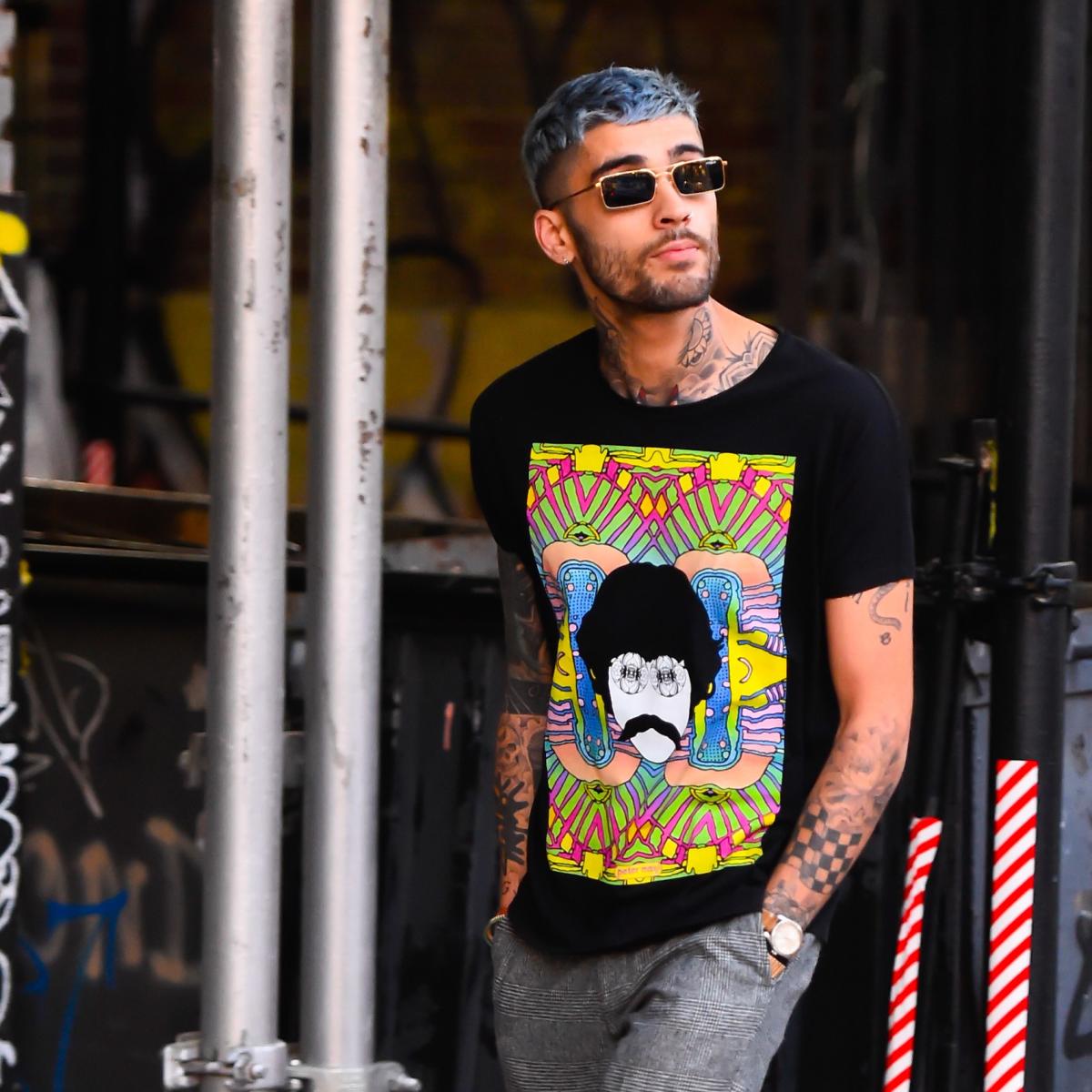 Zayn Malik wears silk shirt to Louis Vuitton show in Paris