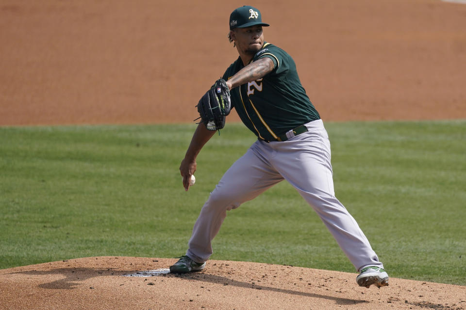 Oakland Athletics' Frankie Montas pitches against the Houston Astros during the first inning of Game 4 of a baseball American League Division Series in Los Angeles, Thursday, Oct. 8, 2020. (AP Photo/Ashley Landis)