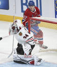 Chicago Blackhawks goaltender Petr Mrazek is scored on by Montreal Canadiens' Cole Caufield during the second period of an NHL hockey game in Montreal, Saturday, Oct. 14, 2023. (Graham Hughes/The Canadian Press via AP)