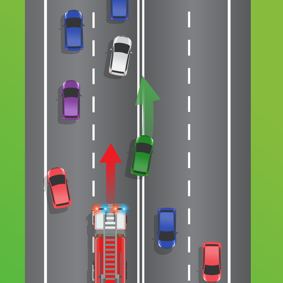 Queensland's Department of Transport and Main Roads shared this graphic of a green car crossing the double white lines as a fire truck approaches from behind.