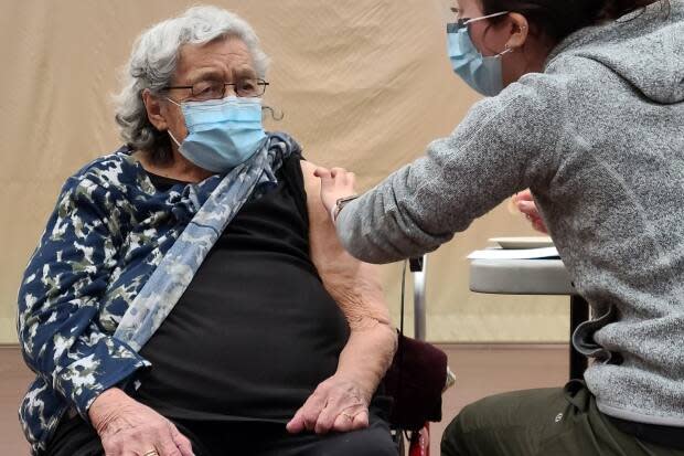 Elder Joan Peters, who got her first dose of the Pfizer-BioNTech vaccine in Musqueam on Tuesday says, 'Everyone should get it done, I'd say.'