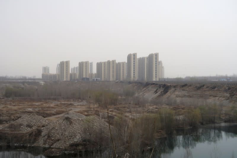 FILE PHOTO: The Taoyuan Xindu Kongquecheng apartment compound developed by China Fortune Land Development is seen in Zhuozhou