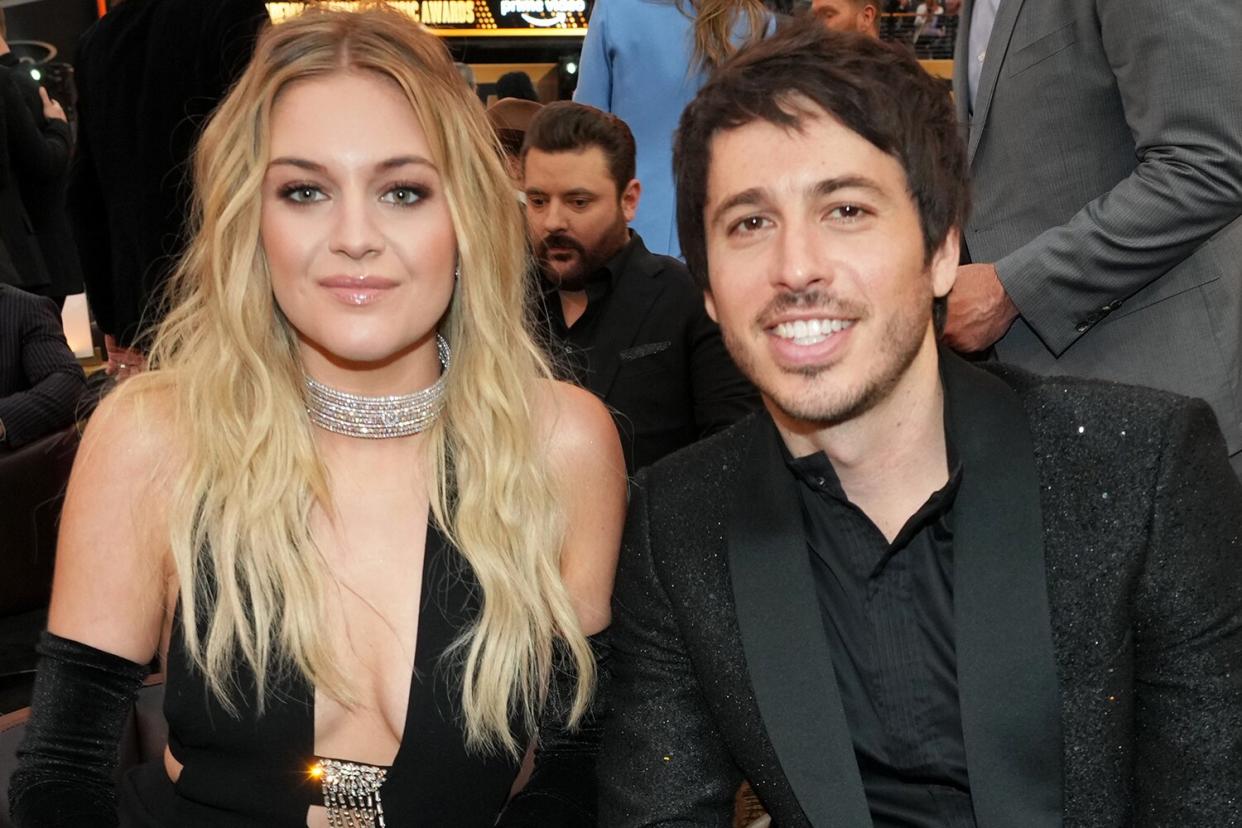 Kelsea Ballerini (L) and Morgan Evans attend the 57th Academy of Country Music Awards