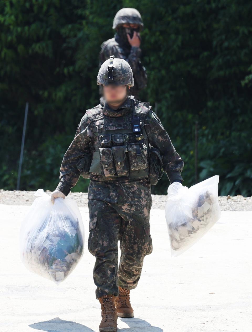 ‘Garbage’ balloons presumably sent by North Korea land in South Korea (EPA)