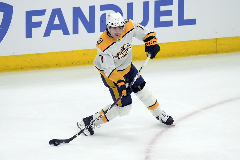 Nashville Predators right wing Luke Evangelista shoots the puck during the first period of an NHL hockey game against the Chicago Blackhawks, Friday, April 12, 2024, in Chicago. (AP Photo/Erin Hooley)