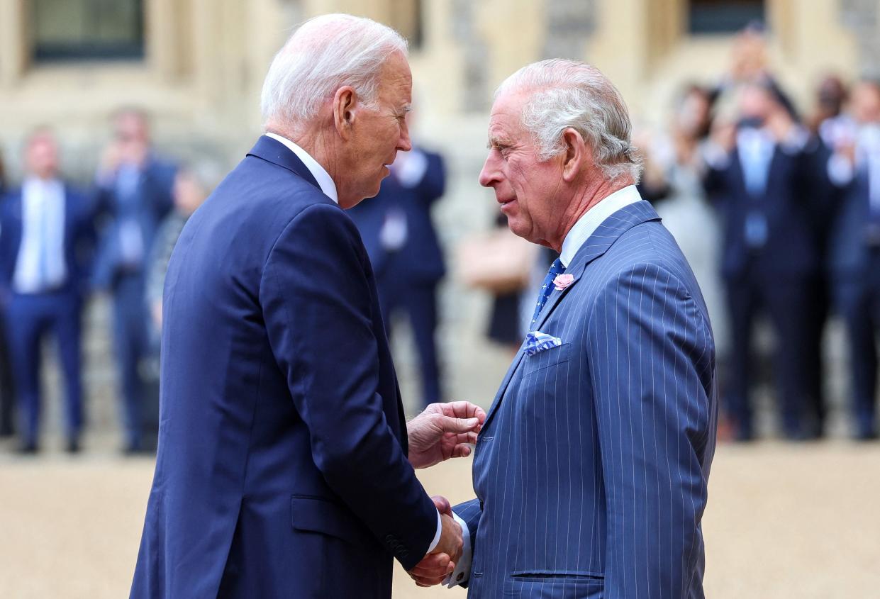 US President Joe Biden is greeted by King Charles III (POOL/AFP via Getty Images)