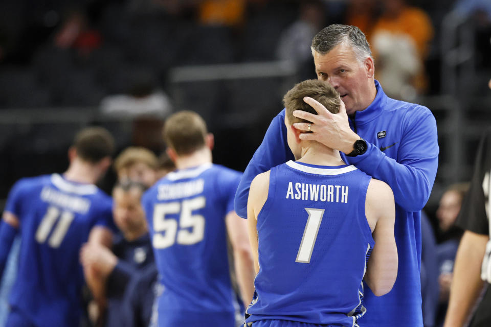 Creighton head coach Greg McDermott hugs guard Steven Ashworth (1) after the second half of a Sweet 16 college basketball game against Tennessee in the NCAA Tournament, Friday, March 29, 2024, in Detroit. (AP Photo/Duane Burleson)