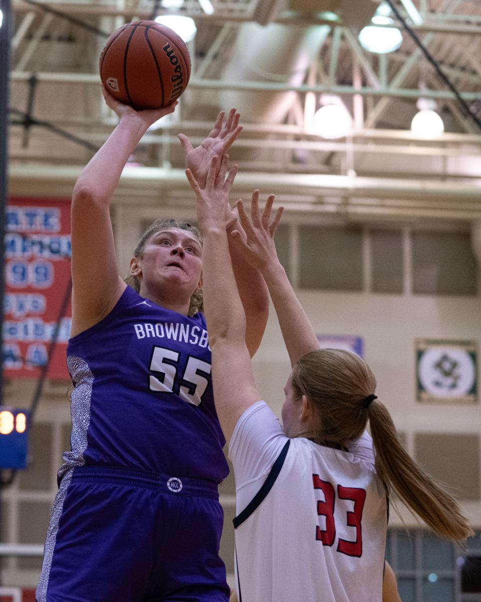 Brownsburg Bulldogs junior center Avery Gordon shoots a layup Jan 5, 2024, at Plainfield High School in Plainfield, Indiana.