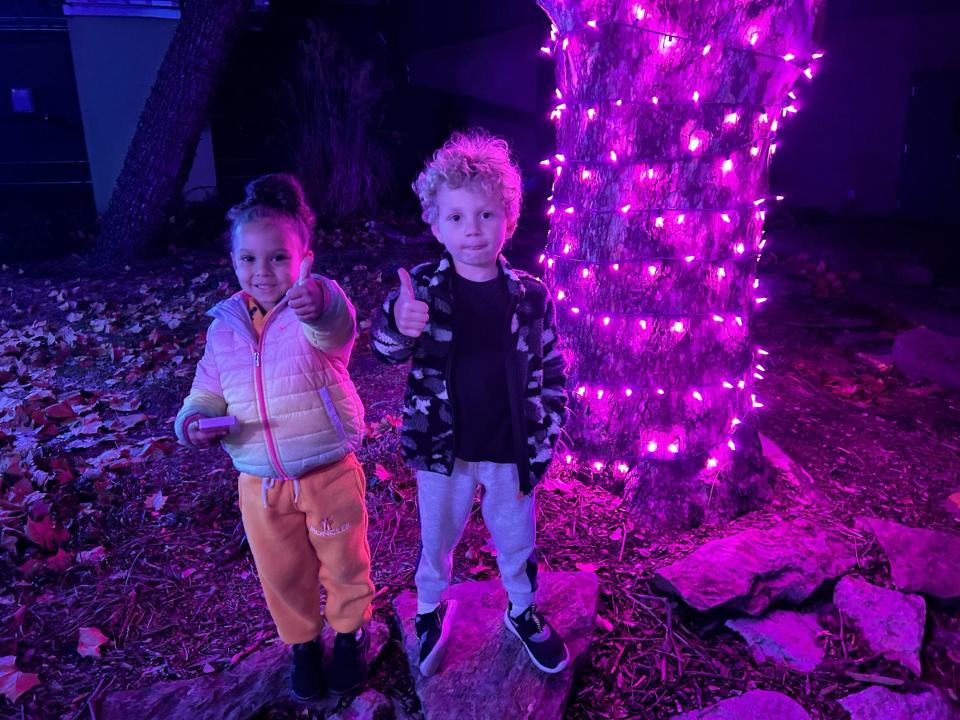 Gigi Miller and Lenny Isley show their approval for Topeka Zoo Lights.