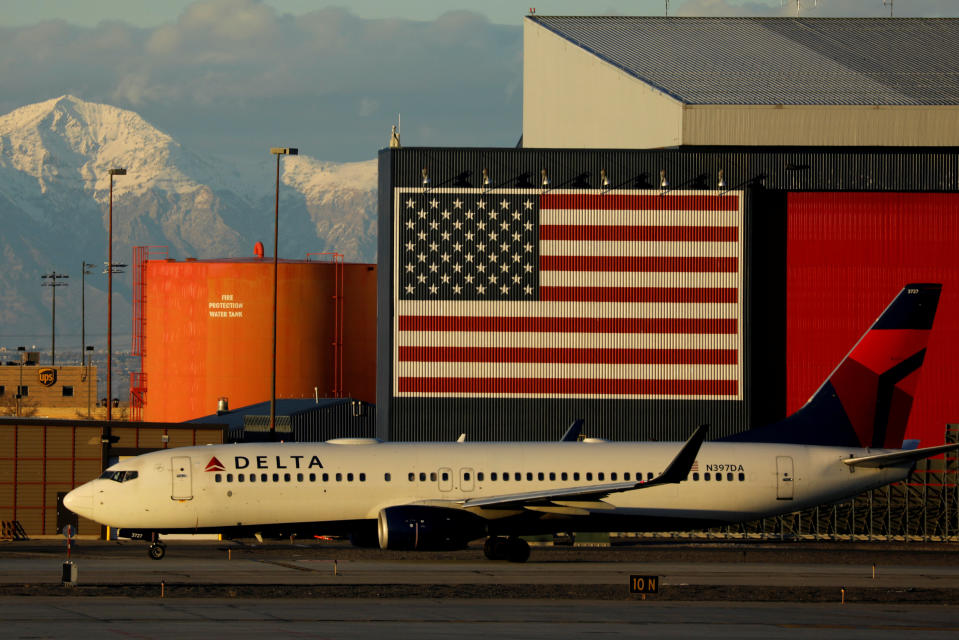 FILE PHOTO: A Delta Air Lines Boeing 737-800 plane arrives in Salt Lake City, Utah, U.S., January 12, 2018. REUTERS/Mike Blake/File Photo GLOBAL BUSINESS WEEK AHEAD