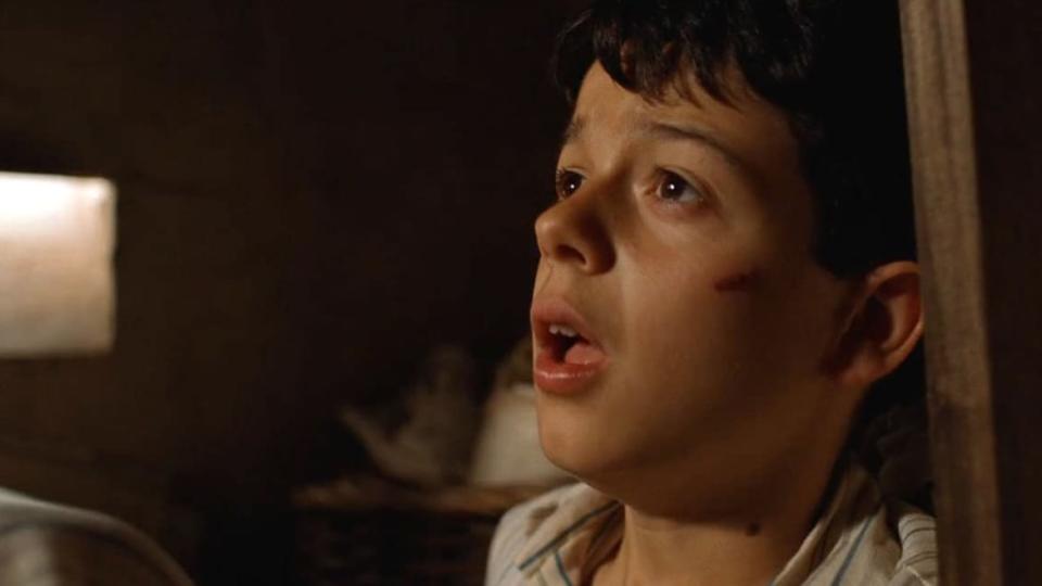 <div class="inline-image__caption"><p>Carlos, played by Fernando Tielve, in <em>The Devil’s Backbone</em></p></div> <div class="inline-image__credit">Courtesy of Warner Sogefilms </div>