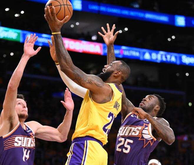 Los Angeles, California October 26, 2023-Lakers LeBron James drives to the basket.