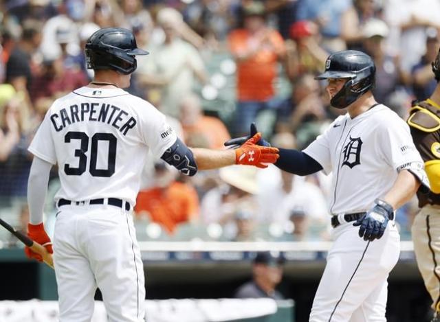 Orioles score five in the seventh, come back to beat Tigers 7-4