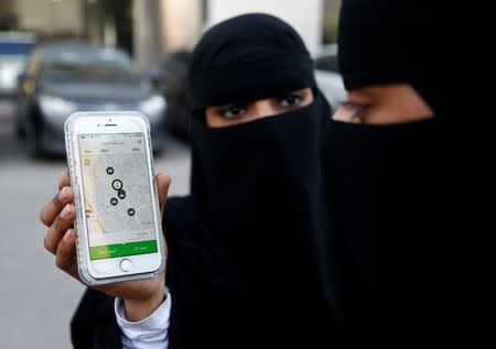 A Saudi woman shows the Careem app on her mobile phone in Riyadh, Saudi Arabia, January 2, 2017. REUTERS/Faisal Al Nasser