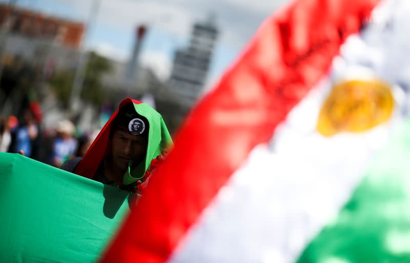 Demonstrators take part in a protest as a national strike continues in Bogota