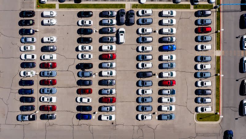 Cars fill a dealership lot downtown in Salt Lake City on May 13, 2021. Auto sales, leases and repairs made up the top category of complaints consumers made to consumer protection organizations in the United States, according to a report. 