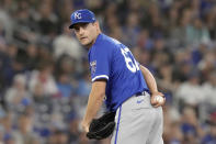 Kansas City Royals pitcher Seth Lugo (67) looks to first base as he works against the Kansas City Royals during the first inning of a baseball game in Toronto, Wednesday, May 1, 2024. (Chris Young/The Canadian Press via AP)