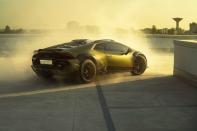 <p>We've known that Lamborghini was preparing to make a rally-raid-inspired version of its Huracán supercar, and we wrote about the concept <a href="https://www.caranddriver.com/news/a27719367/lamborghini-huracan-sterrato-concept/" rel="nofollow noopener" target="_blank" data-ylk="slk:in 2019;elm:context_link;itc:0;sec:content-canvas" class="link ">in 2019</a>. Four years later, here's the production version, the Huracán Sterrato. There will be only 900 produced worldwide, and the first customers will get them next year. The Sterrato is also the end of the Huracán model line—and the last Lamborghini to be powered by the Italian company's naturally aspirated V-10 engine. </p><p><a class="link " href="https://www.caranddriver.com/news/a42088839/2023-lamborghini-huracan-sterrato-revealed/" rel="nofollow noopener" target="_blank" data-ylk="slk:READ THE FULL STORY;elm:context_link;itc:0;sec:content-canvas">READ THE FULL STORY</a></p>