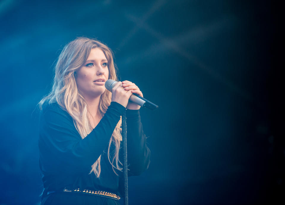 BIRMINGHAM, UNITED KINGDOM - AUGUST 30: Ella Henderson performs onstage during day 1 of  Fusion Festival 2014 on August 30, 2014 in Birmingham, England. (Photo by Ollie Millington/Redferns via Getty Images)