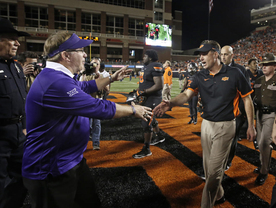 TCU’s Gary Patterson and Oklahoma State’s Mike Gundy have a marquee matchup on Saturday. (Getty)