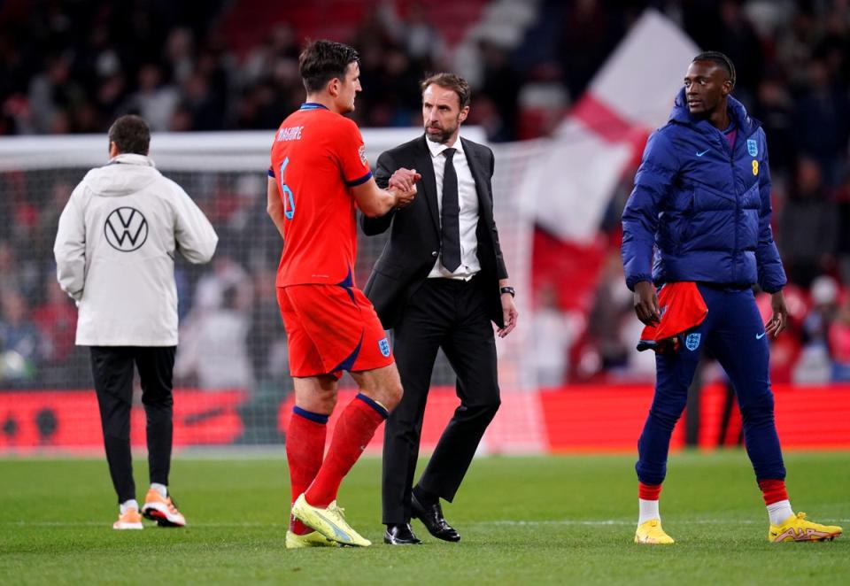 Gareth Southgate shakes hands with Harry Maguire (John Walton/PA) (PA Wire)