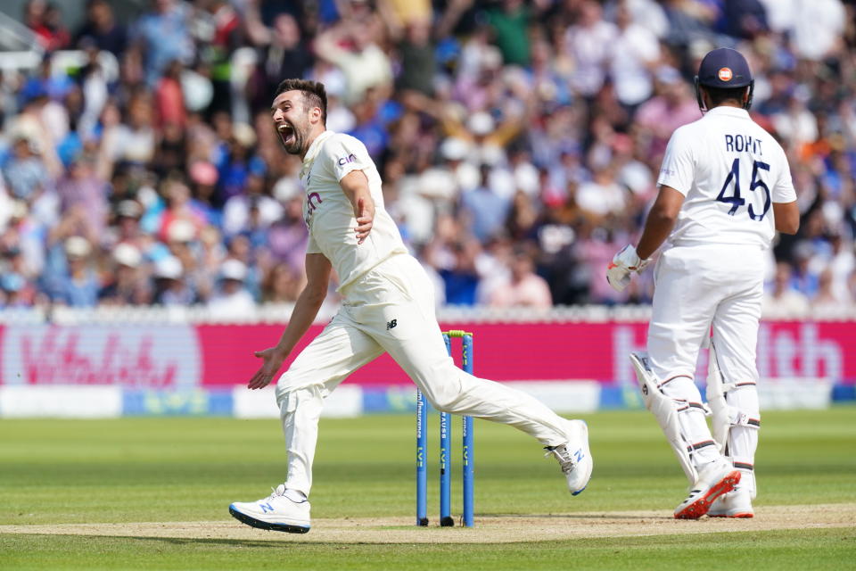 Englands Mark Wood celebrates after taking the wicket of Indias Rohit Sharma during day four of the cinch Second Test match at Lord's, London. Picture date: Sunday August 15, 2021. (Photo by Zac Goodwin/PA Images via Getty Images)