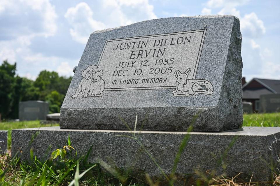 The headstone for Justin Ervin, who was murdered on Dec. 10, 2005, sits in the graveyard at Trinity United Methodist Church off Beatties Ford Road.