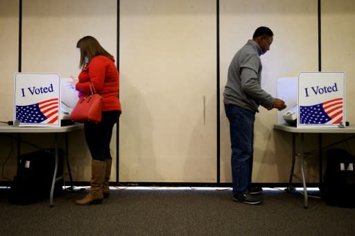 People cast their votes in the Democratic presidential primary at a polling station at North Springs Elementary School in Columbia, South Carolina