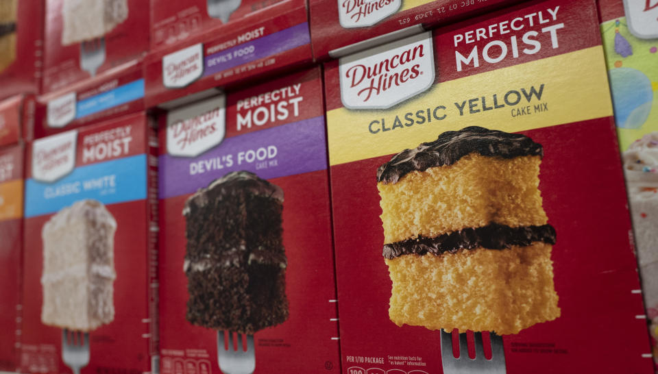 Boxes of Duncan Hines cake mix are displayed Thursday, March 25, 2021, in a New York supermarket. Conagra Brands, which owns Duncan Hines, reports earnings, April 8, 2021. (AP Photo/Mark Lennihan)