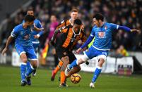 <p>Abel Hernandez of Hull City (C) attempts to take the ball past Adam Smith of AFC Bournemouth (R) and Andrew Surman</p>