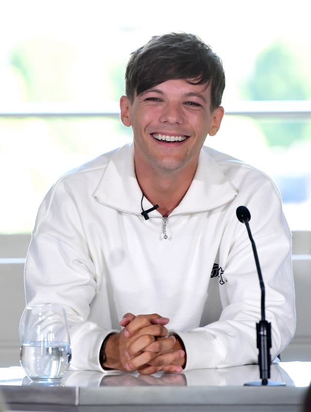 Louis Tomlinson says he 'never thought' he'd be a dad at 24 as