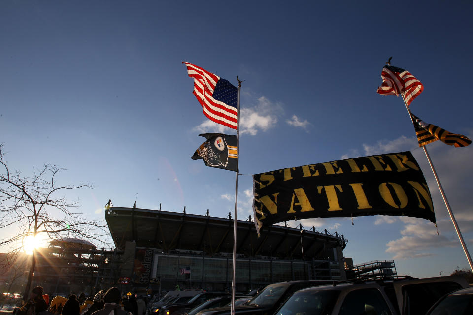 PITTSBURGH, PA - JANUARY 23:  "Steeler Nation" tailgates outside the stadium prior to the Pittsburgh Steelers and the New York Jets playing in the 2011 AFC Championship game at Heinz Field on January 23, 2011 in Pittsburgh, Pennsylvania.  (Photo by Ronald Martinez/Getty Images)
