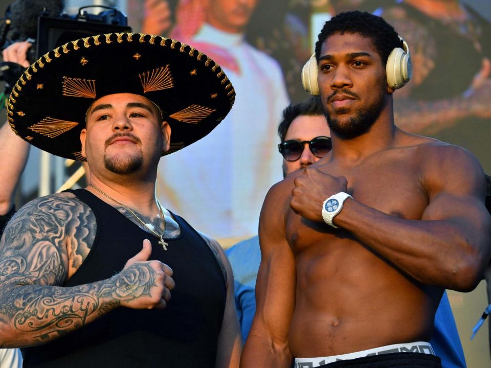 Andy Ruiz Jr and Anthony Joshua pose at the weigh-in: Getty