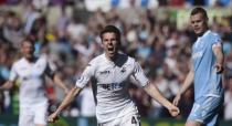 Britain Soccer Football - Swansea City v Stoke City - Premier League - Liberty Stadium - 22/4/17 Swansea City's Tom Carroll celebrates scoring their second goal Reuters / Rebecca Naden Livepic