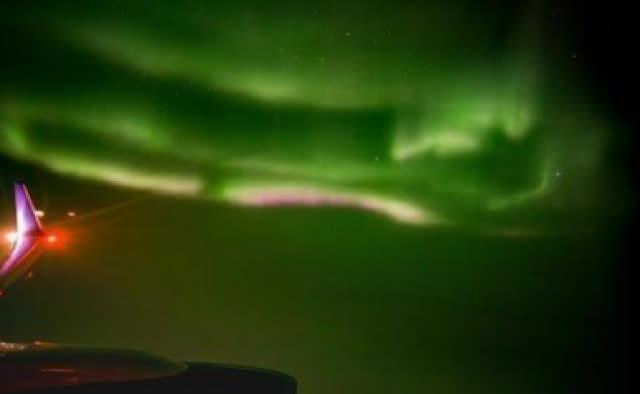 Plane passenger captures Northern Lights video through window