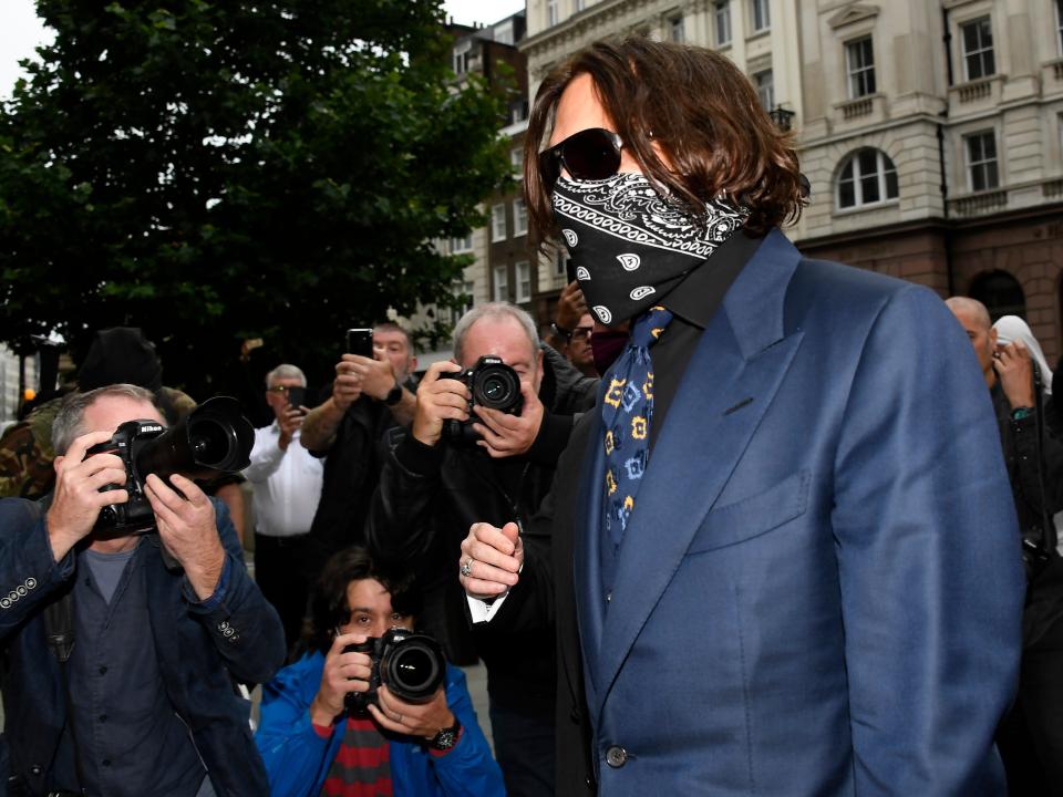 Johnny Depp arrives at the High Court in London, Thursday, July 9, 2020. Johnny Depp is back in the witness box for a third day at the trial of his libel suit against a tabloid newspaper that called him a “wife-beater.” Depp is suing News Group Newspapers, publisher of The Sun, and the paper’s executive editor, Dan Wootton, over an April 2018 article that said he’d physically abused ex-wife Amber Heard.  He strongly denies ever hitting Heard. (AP Photo/Alberto Pezzali)