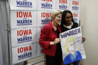 Democratic presidential candidate Sen. Elizabeth Warren, D-Mass., poses for a photo with supporter Jermisha Hinton after speaking at a campaign event, Saturday, Jan. 18, 2020, in Des Moines, Iowa. (AP Photo/Patrick Semansky)