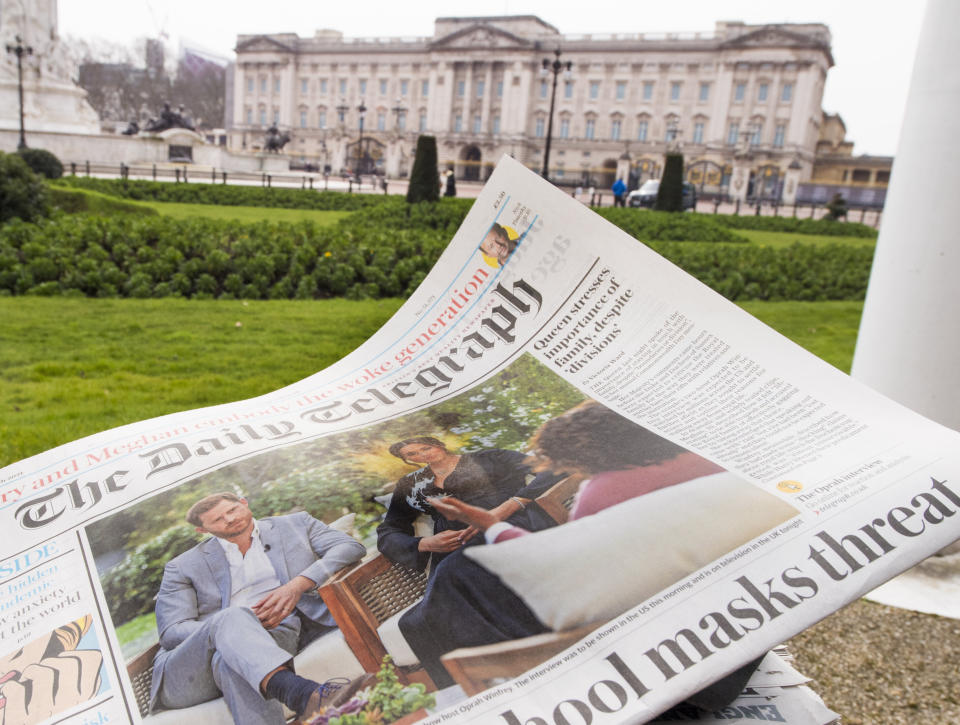 A British newspaper flutters in the wind outside Buckingham Palace in London the day after the Duke and Duchess of Sussex's interview with Oprah Winfrey which is being shown on ITV. Picture date: Monday March 8, 2021. (Photo by Ian West/PA Images via Getty Images) (Photo: Ian West - PA Images via Getty Images)