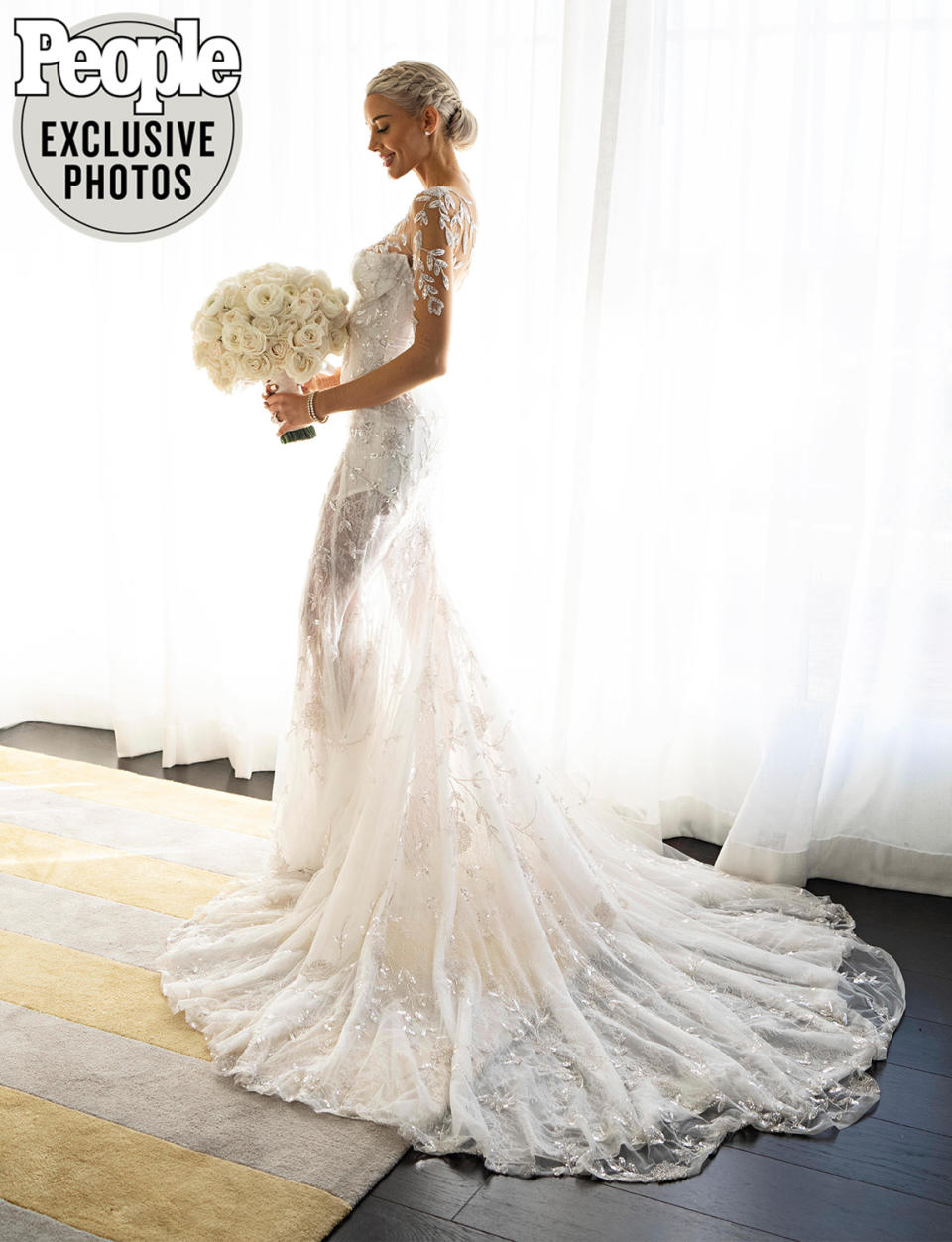 <p>Heather wore a corset wedding dress with sheer embroidered sleeves and a French lace skirt custom-made by Israeli designer <a href="https://www.galialahav.com/" rel="nofollow noopener" target="_blank" data-ylk="slk:Galia Lahav;elm:context_link;itc:0;sec:content-canvas" class="link ">Galia Lahav</a> for both the ceremony and the reception.</p> <p>The gown fit Young like a glove, and intricate details — including a sweetheart-style neckline, crystal embellishments throughout and hand-crafted beading that appeared to be "painted on" — took the design to the next level.</p> <p>"It's so delicate, beautiful and sexy, but classy and timeless. It goes with the Old Hollywood feel of the wedding," Heather says. "It's hard to describe, but it's the prettiest dress I've ever seen in my life."</p>