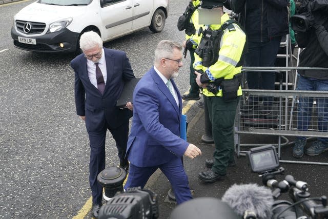 Sir Jeffrey Donaldson walks into court