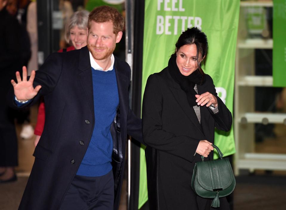 Meghan carries DeMellier in Cardiff, January 2018 (Getty Images)
