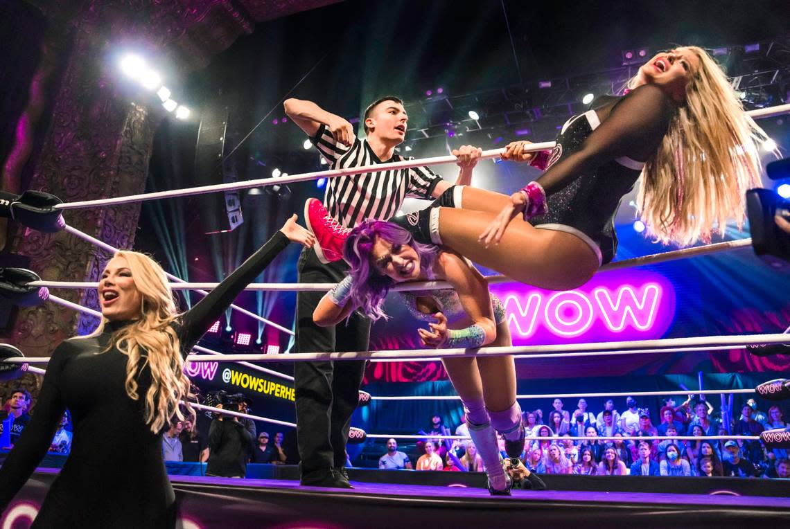 Penelope Pink (Marina Tucker) with Lana Star controls Chantilly Chella during WOW-Women Of Wrestling.  