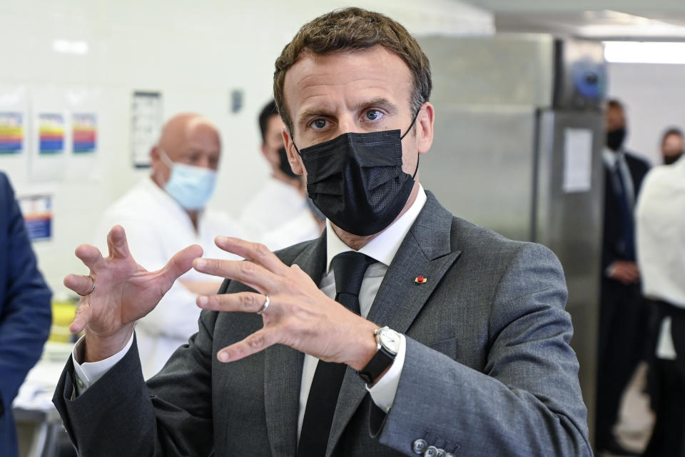 French President Emmanuel Macron talks to journalists Tuesday June 8, 2021 at the Hospitality school in Tain-l'Hermitage, southeastern France. French President Emmanuel Macron has been slapped in the face by a man during a visit in a small town of southeastern France, Macron's office confirmed. (Philippe Desmazes, Pool via AP)